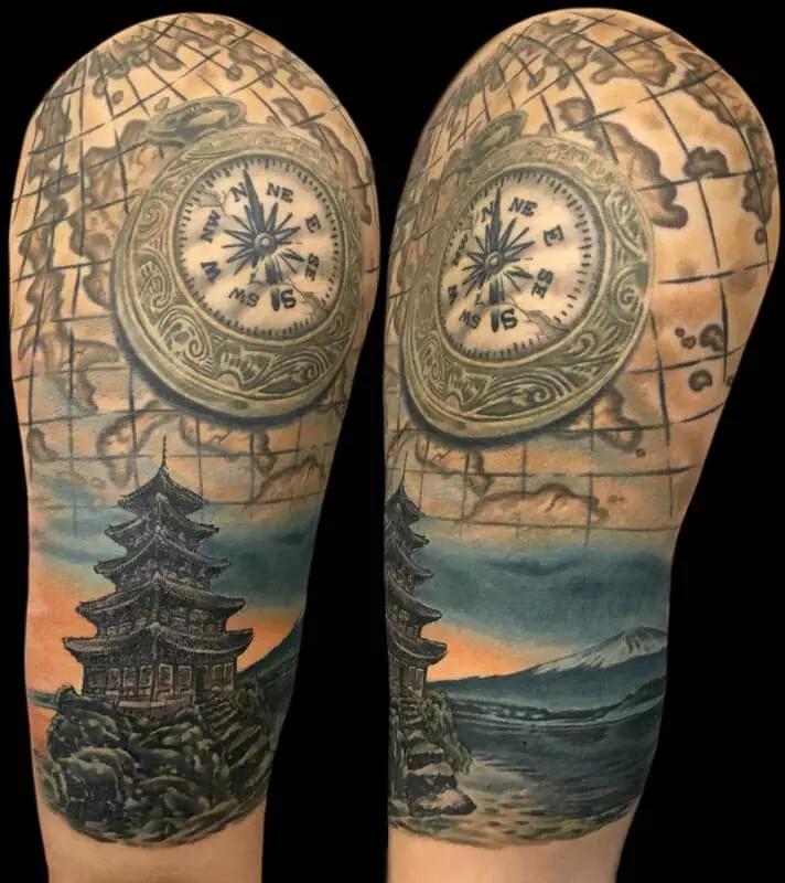 A tattoo of a compass and a map.