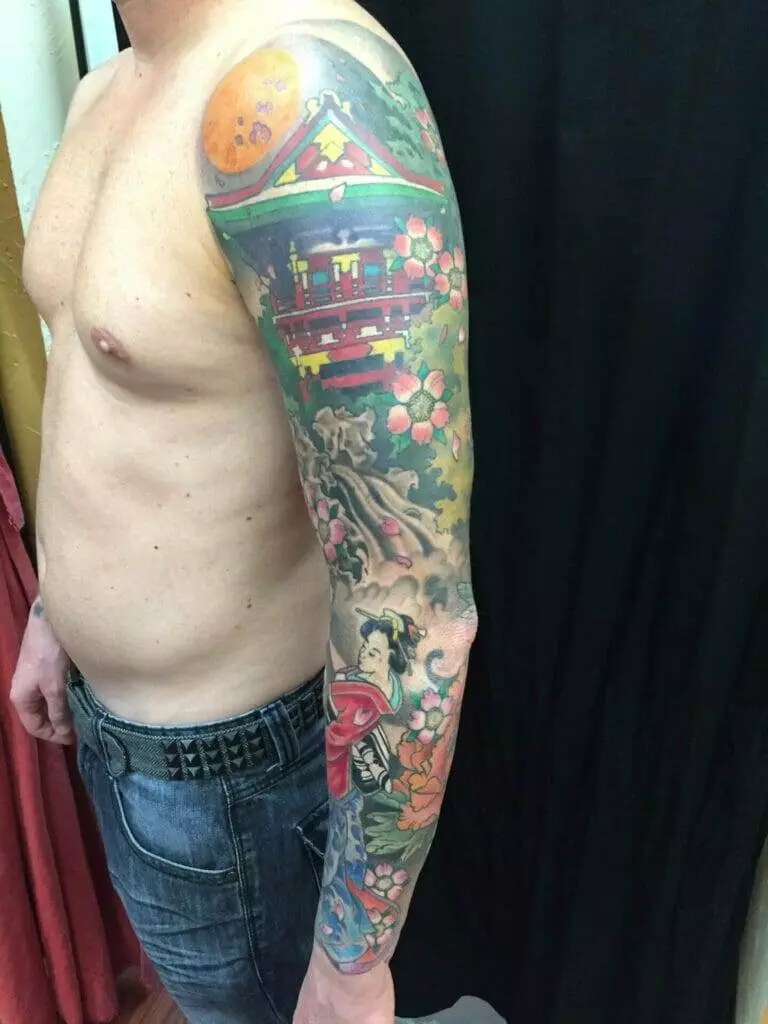 Colorful sleeve tattoo, man.