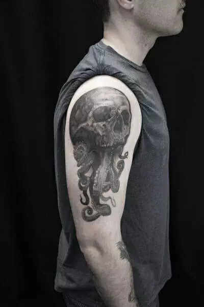 A man with an octopus tattoo on his arm.