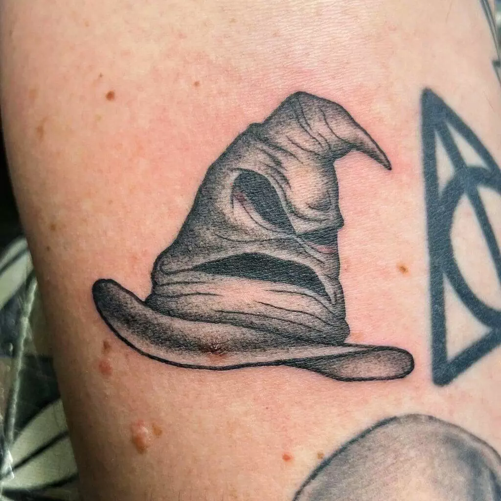 Harry potter hat tattoo.