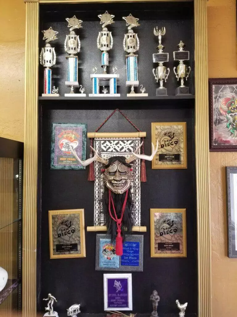 A display case showcasing trophies and medals.