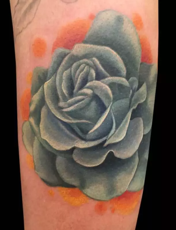 A tattoo of a succulent flower.