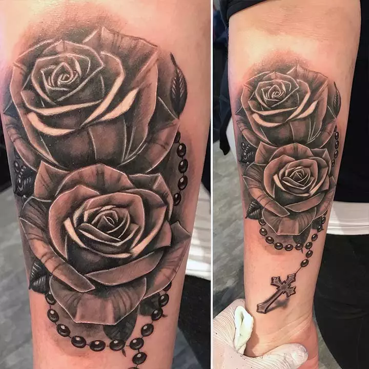 Two forearm tattoos.