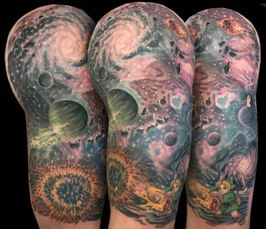 A sleeve with a galaxy tattoo on it.