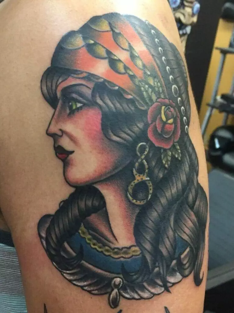 A tattoo of a woman wearing a turban.