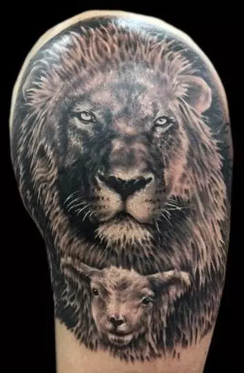 A tattoo of a lion and a lamb.