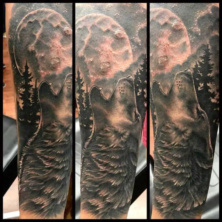 Howling wolf sleeve tattoo.