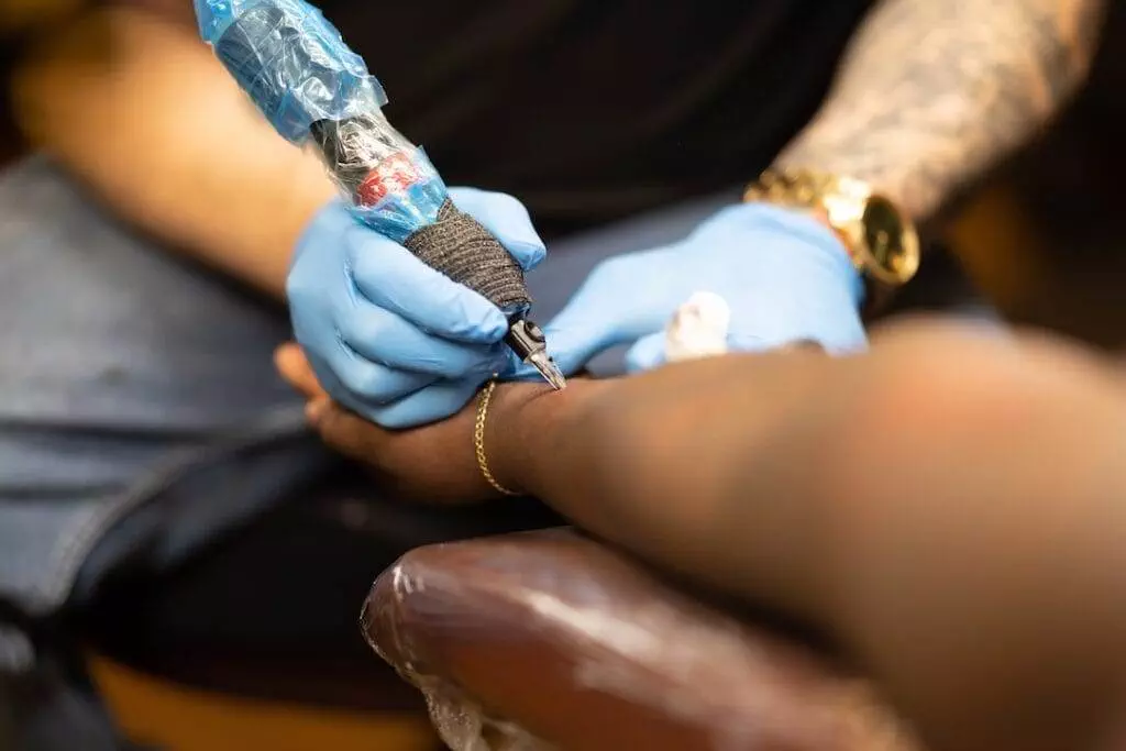 A person getting a tattoo.